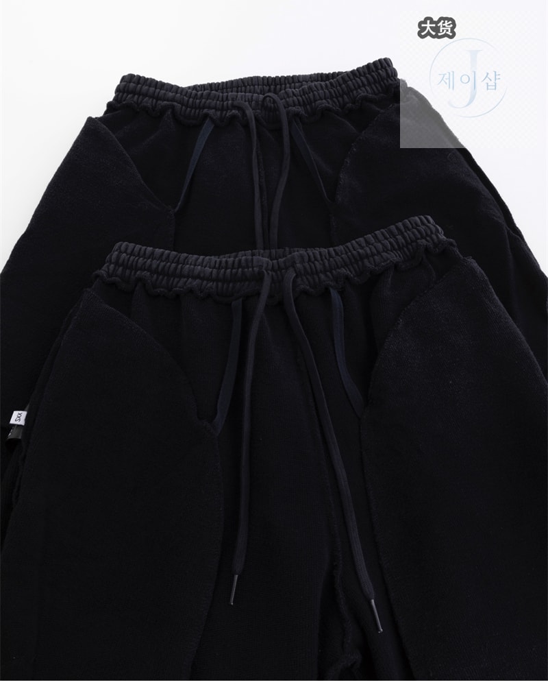 발렌시아가 트랜스페어런트 테이프 배기 팬츠