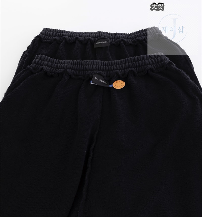 발렌시아가 트랜스페어런트 테이프 배기 팬츠