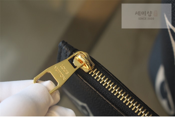 Louis Vuitton 루이비통 네버풀 MM 앙프렝뜨 모노그램 M58907 블랙 바이컬러 Bag 7번 이미지