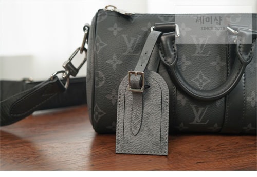 Louis Vuitton 루이비통 이클립스 모노그램 리버스 키폴 반둘리에 25 M46271 이클립스 모노그램 Bag 21번 이미지