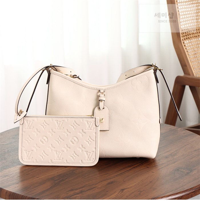 Louis Vuitton 루이비통 캐리올 PM 앙프렝트 모노그램 M46293 크림 Bag 17번 이미지