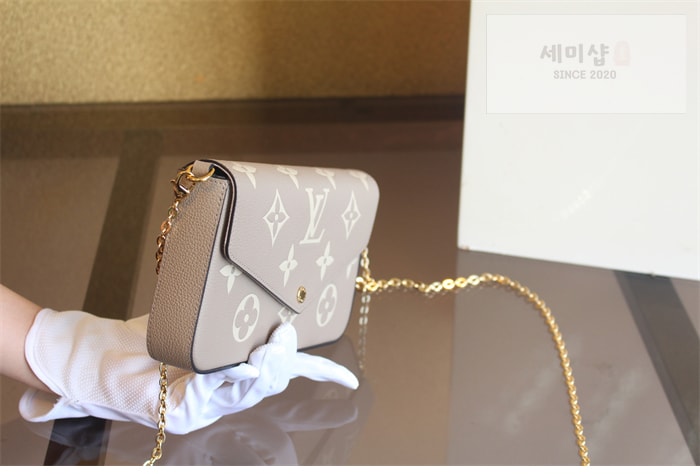 Louis Vuitton 루이비통 포쉐트 펠리시 앙프렝뜨 모노그램 M69977 바이컬러갈렛 Bag 7번 이미지