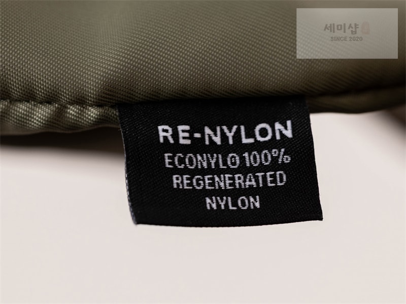 미우미우 미우미우 개버딘 파우치 올리브 그린 5NE841 Bag 24번 이미지
