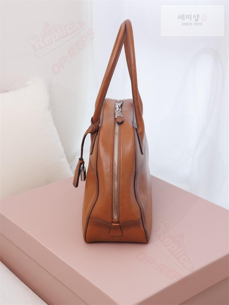 Miu Miu 미우미우 비방 나파 레더 백 꼬냑 5BB196 꼬냑 Bag 6번 이미지