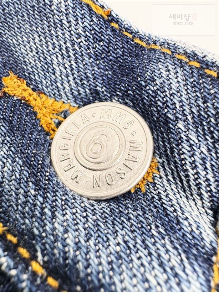 Maison Margiela 메종 마르지엘라 트위스트 와이드 레그 진 의류 7번 이미지