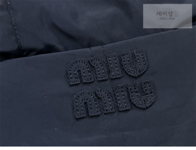 Miu Miu 미우미우 파나마 코튼 테크니컬 퐁제 블루종 자켓 의류 11번 이미지