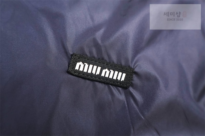 Miu Miu 미우미우 25FW 로고 아플리케 리버시블 후드 집업 의류 7번 이미지