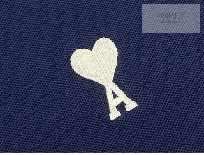 A M I 아미 드 꾀흐 화이트 하트 반소매 폴로 셔츠 브라운 의류 5번 이미지