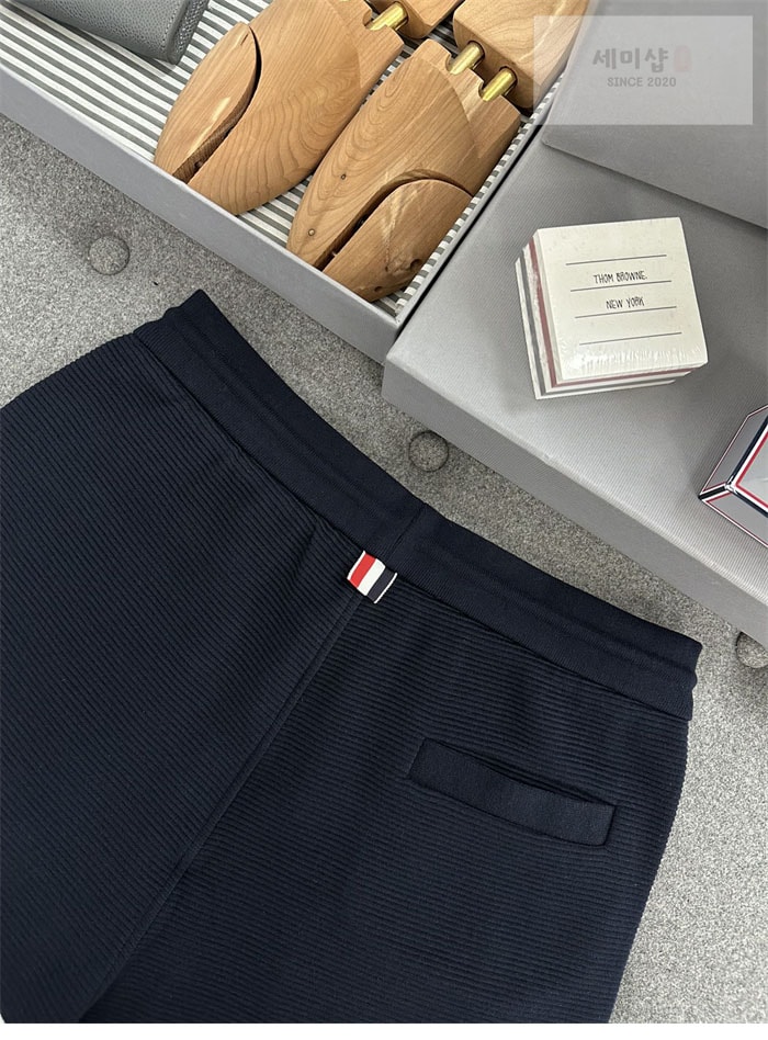 Thom Browne 톰브라운 사선완장 와플 반팔 폴로 셔츠&스웨트 반바지 네이비 의류 6번 이미지