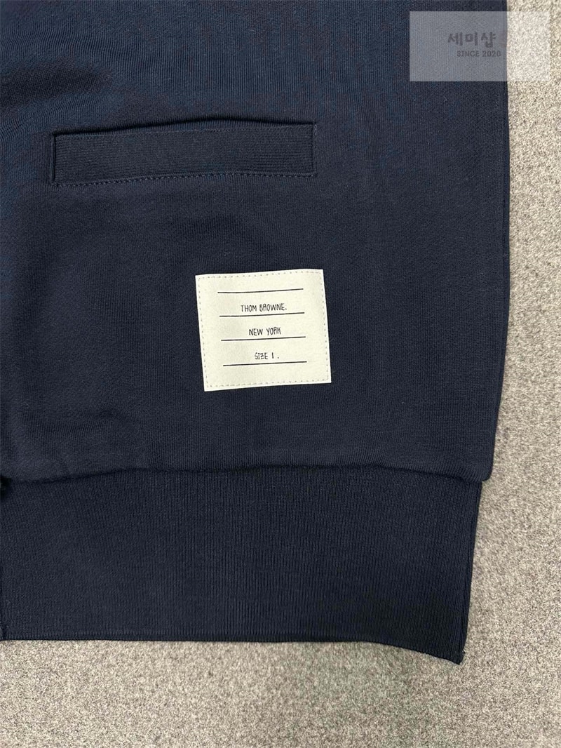 Thom Browne 톰브라운 사선완장 4-Bar 루프백 저지 v넥 가디건 의류 4번 이미지