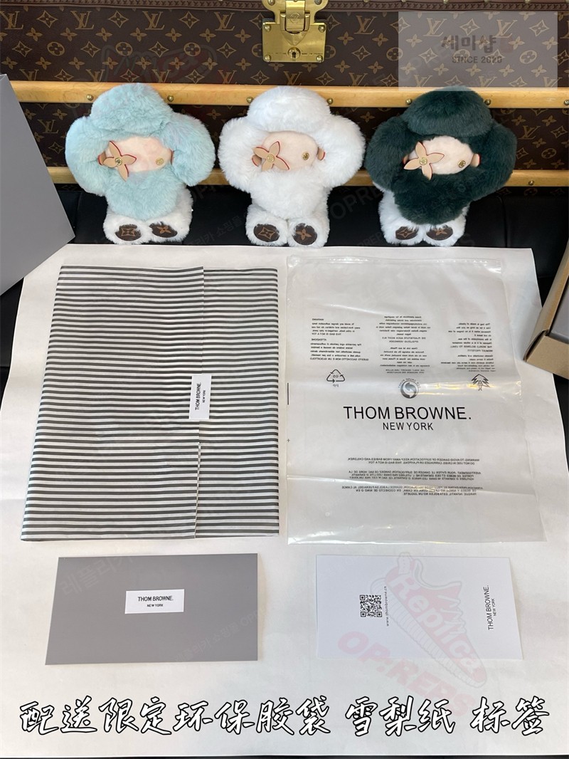 Thom Browne 톰브라운 사선 스트라이프 V넥 니트 베스트 네이비 의류 33번 이미지