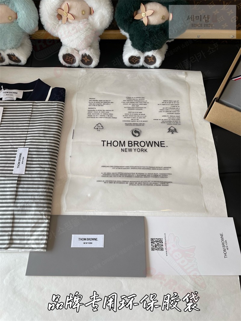 Thom Browne 톰브라운 사선 스트라이프 V넥 니트 베스트 네이비 의류 34번 이미지