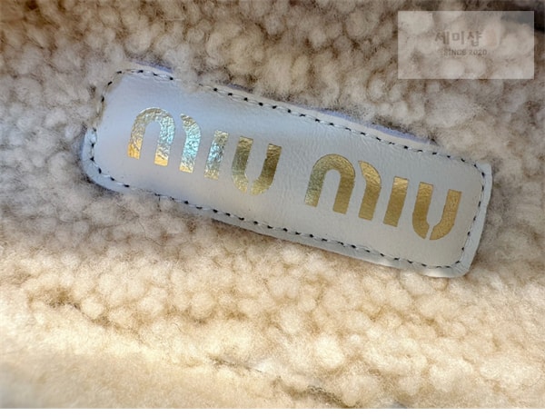Miu Miu 미우미우 시어링 스웨이드 페니 로퍼 신발 12번 이미지