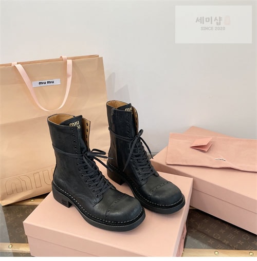 Miu Miu 미우미우 24FW 가죽 레이스 부티 신발 5번 이미지