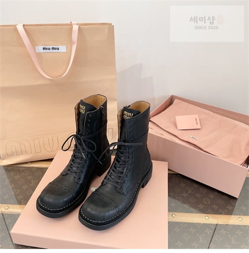 Miu Miu 미우미우 24FW 가죽 레이스 부티 신발 6번 이미지