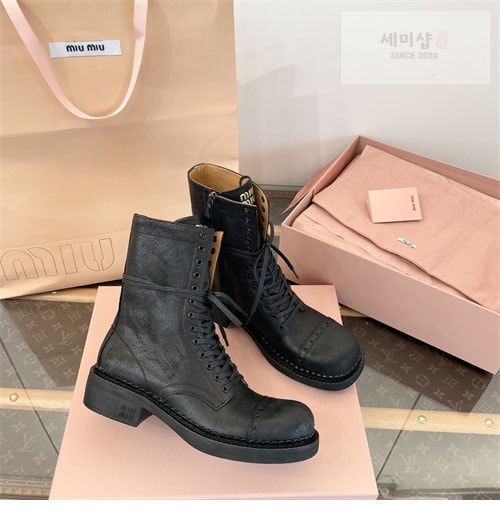 Miu Miu 미우미우 24FW 가죽 레이스 부티 신발 7번 이미지