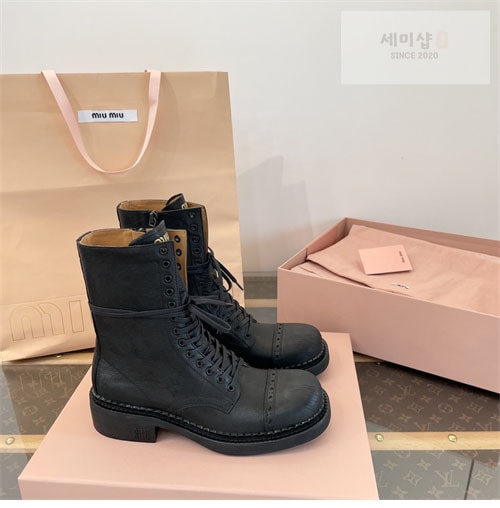 Miu Miu 미우미우 24FW 가죽 레이스 부티 신발 8번 이미지