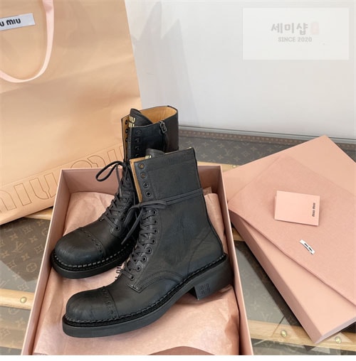 Miu Miu 미우미우 24FW 가죽 레이스 부티 신발 9번 이미지