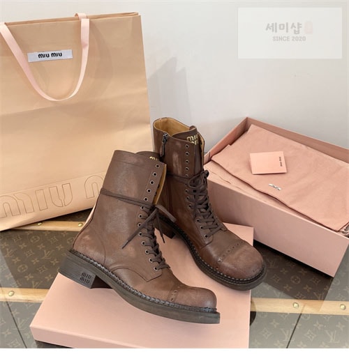 Miu Miu 미우미우 24FW 가죽 레이스 부티 신발 13번 이미지