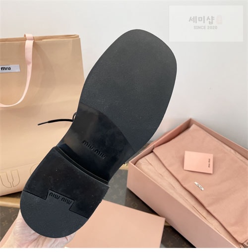 Miu Miu 미우미우 24FW 가죽 레이스 부티 신발 29번 이미지