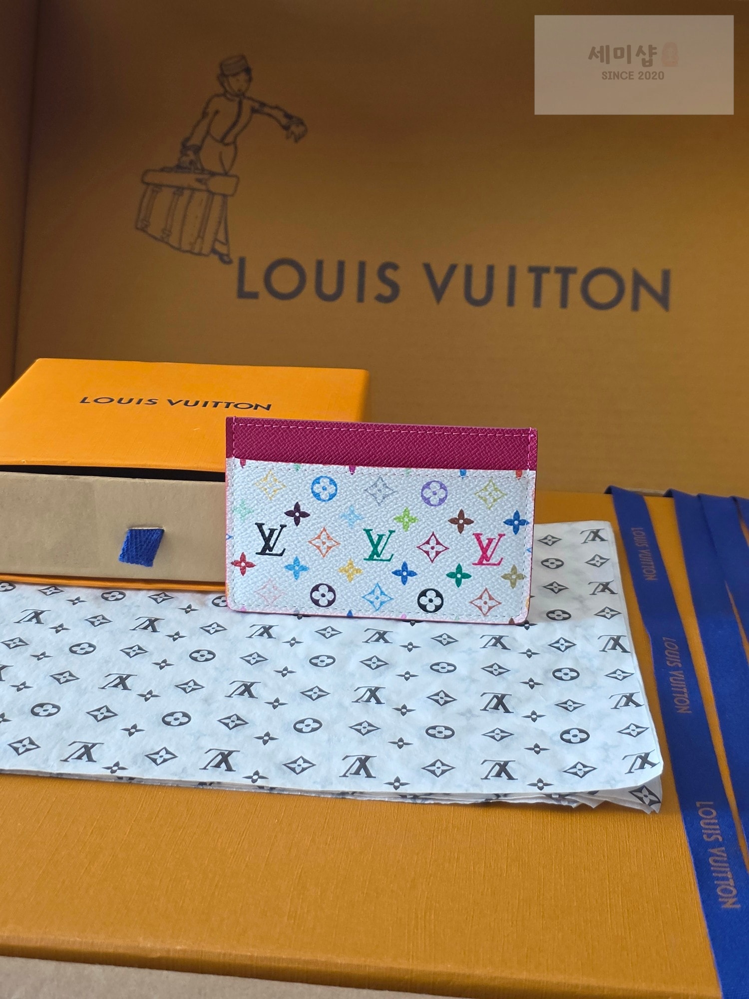 Louis Vuitton 루이비통 포르트 카르트 심플 모노그램 멀티컬러 화이트 멀티컬러 지갑 1번 이미지