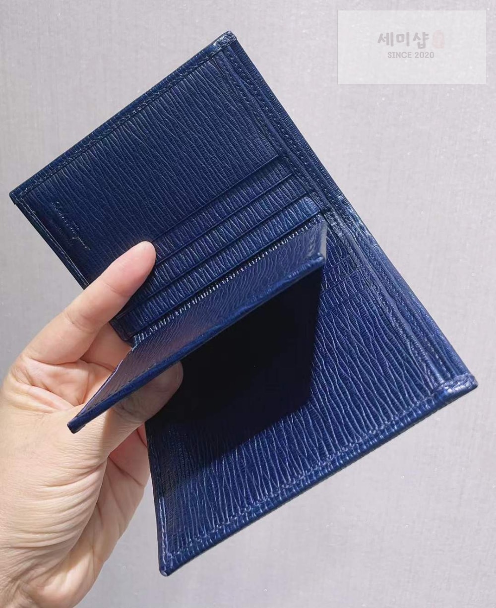 Ferragamo 페레가모 살바토레 간치니 중지갑 네이비 지갑 2번 이미지