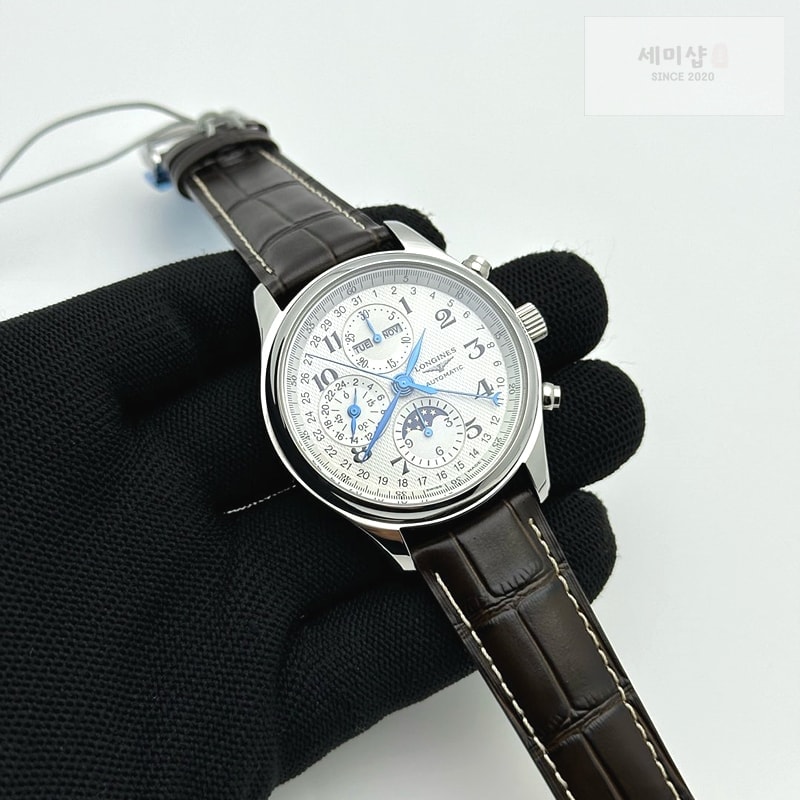 론진 GS공장 론진 마스터컬렉션 문페이즈 스틸 화이트다이얼 가죽스트랩 MASTER MOONPHASE CHRONOGRAPH SS WHITE DIAL ON BROWN LEATHER STRAP A7751 시계 2번 이미지
