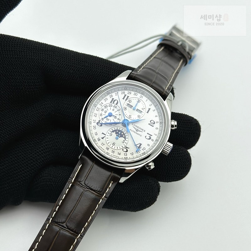 론진 GS공장 론진 마스터컬렉션 문페이즈 스틸 화이트다이얼 가죽스트랩 MASTER MOONPHASE CHRONOGRAPH SS WHITE DIAL ON BROWN LEATHER STRAP A7751 시계 3번 이미지