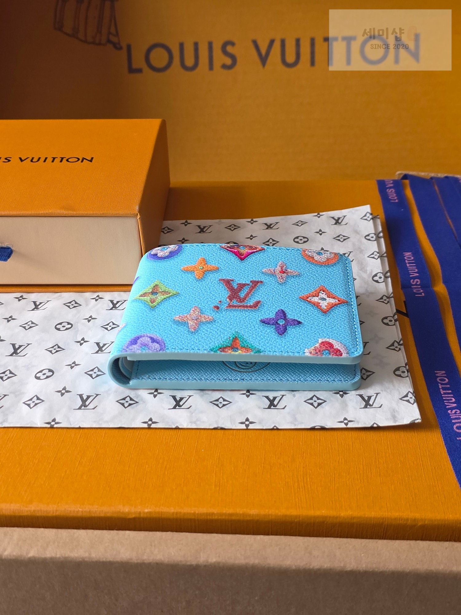 Louis Vuitton 루이비통 슬렌더 월릿 모노그램 크래커 블루 모노그램 블루 지갑 3번 이미지